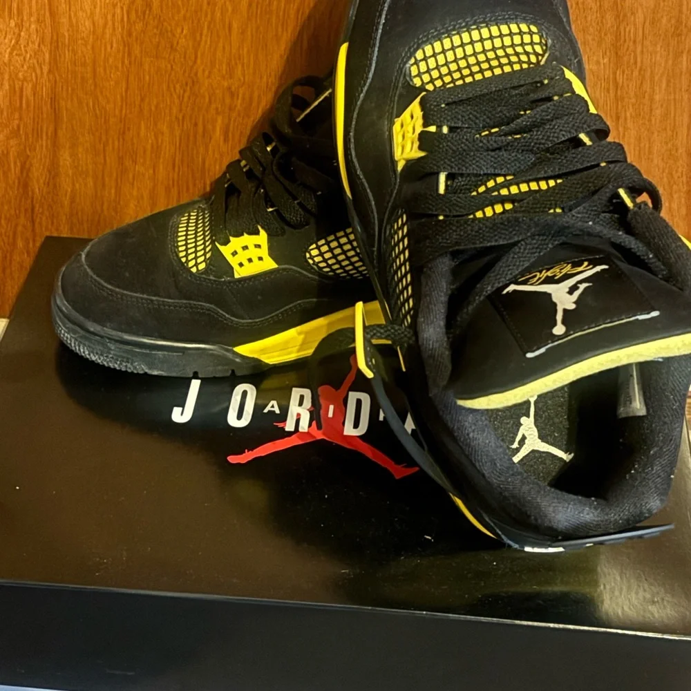 Jordan Men’s Black and Yellow Retro Sneakers